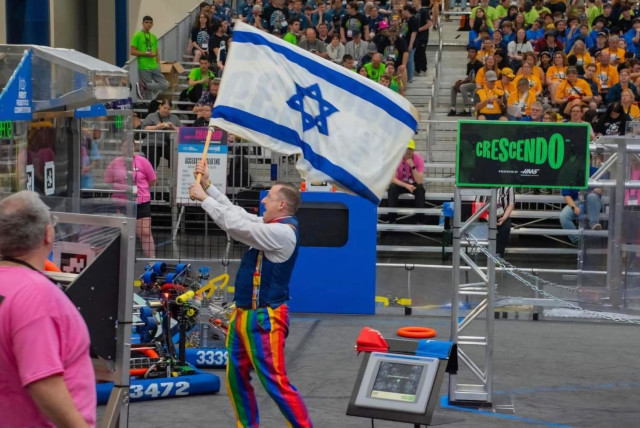 FRC MC in Houston competition waving the Israeli flag after the team from Binyamina won first place. Uploaded on 4/5/2024 (credit: FIRST ISRAEL)
