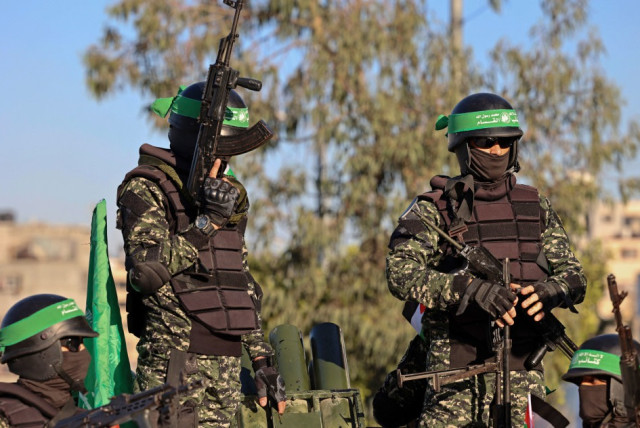  Hamas terrorists (credit: MOHAMMED ABED/AFP via Getty Images)