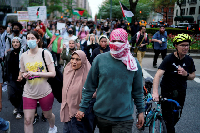 Pro-Palestinian demonstrators attend a protest near the Met Gala, an annual fundraising gala held for the benefit of the Metropolitan Museum of Art's Costume Institute with this year's theme 'Sleeping Beauties: Reawakening Fashion' in New York City, New York, U.S., May 6, 2024. (credit: Eduardo Munoz/Reuters)