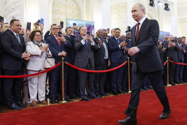  Russian President Vladimir Putin walks before his inauguration ceremony at the Kremlin in Moscow, Russia May 7, 2024. (credit: Sputnik/Artyom Geodakyan/Pool via REUTERS)