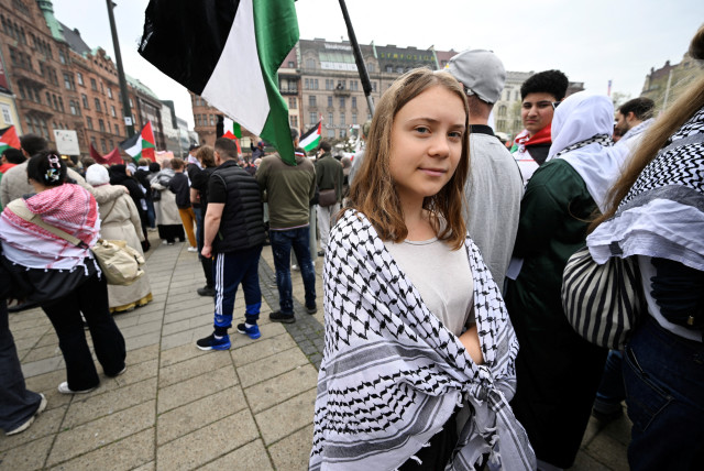  Climate activist Greta Thunberg takes part in the Stop Israel demonstration against Israel's participation in the 68th edition of the Eurovision Song Contest (ESC) in Malmo, Sweden, May 9, 2024. (credit: TT News Agency/Johan Nilsson via REUTERS)