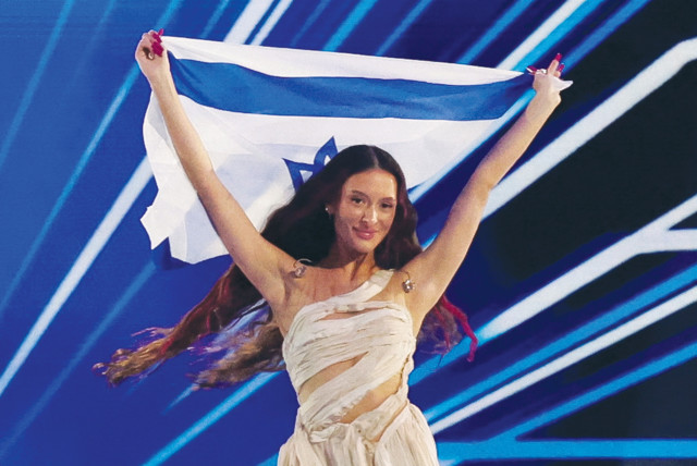  EDEN GOLAN flies Israel’s flag during the Grand Final of the 2024 Eurovision Song Contest, in Malmo, Sweden, last Saturday night (credit: Leonhard Foeger/Reuters)