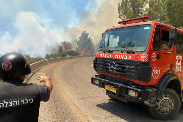  Fire and Rescue Authority brigade works to put out a fire near the Ramim Ridge, northern Israel (credit: ISRAEL FIRE AND RESCUE AUTHORITY)