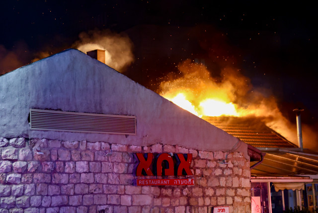  Israeli firefighters try to extinguish a fire which broke at the Ima Restaurant, in Jerusalem, June 6, 2024. (credit: Dor Pazuelo/Flash90)