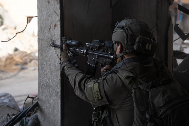  IDF soldier operates in the Gaza Strip.  (credit: IDF SPOKESPERSON'S UNIT)