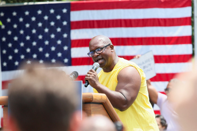  US Representative Jamaal Bowman (D-NY) speaks to the crowd while he campaigns in the Bronx borough of New York City, US, June 22, 2024. (credit: REUTERS/Joy Malone)