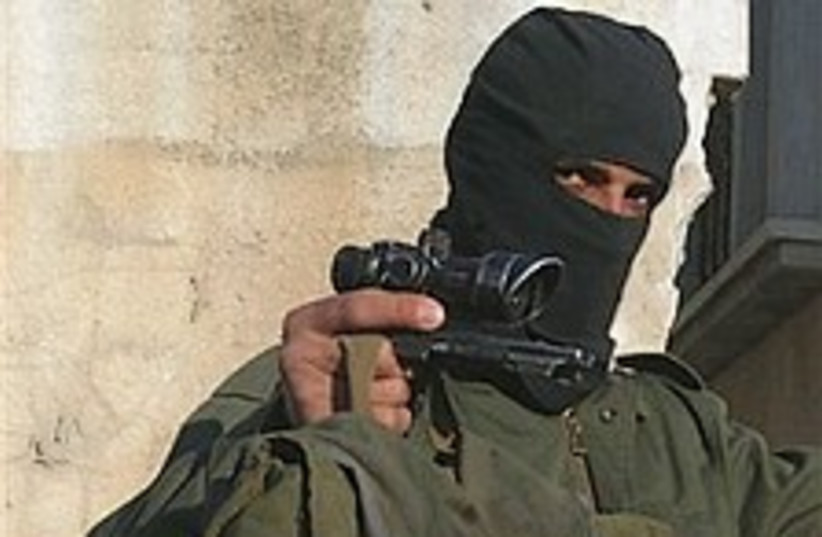 Hamas masked gd224.8 (photo credit: AP [file])