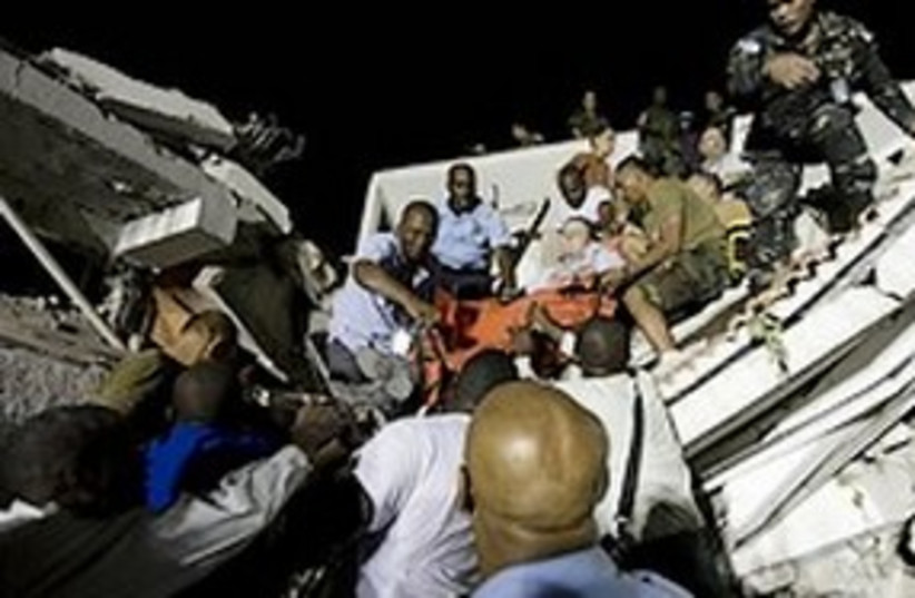 Search and rescue efforts at the UN headquarters in Haiti (photo credit: AP)