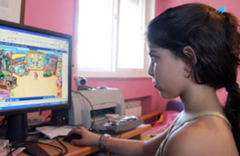 A schoolgirl checks out the Web (photo credit: Ariel Jerozolimski)
