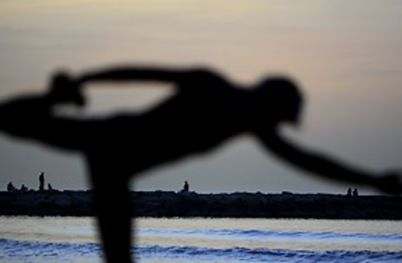 sea yoga pretty 311 (photo credit: AP)