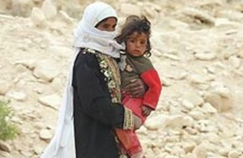 A Beduin woman and child 311 AJ (photo credit: Ariel Jerozolimski)