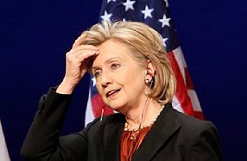 Clinton scratches head 311 (photo credit: Associated Press)