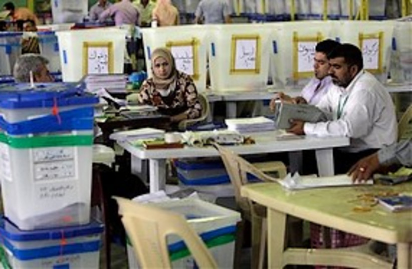 Iraqi Electoral workers 311 (photo credit: Associated Press)