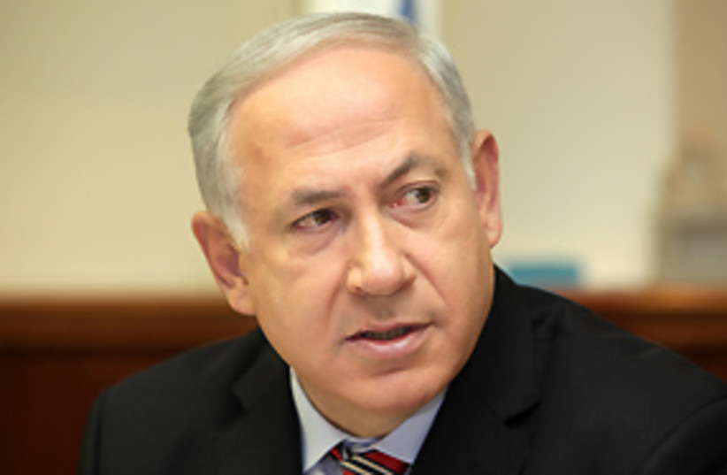 Netanyahu looking over shoulder 311 (photo credit: Ariel Jerozolimski)