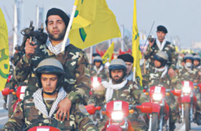 Iranian Revolutionary Guards volunteers (photo credit: Associated Press)