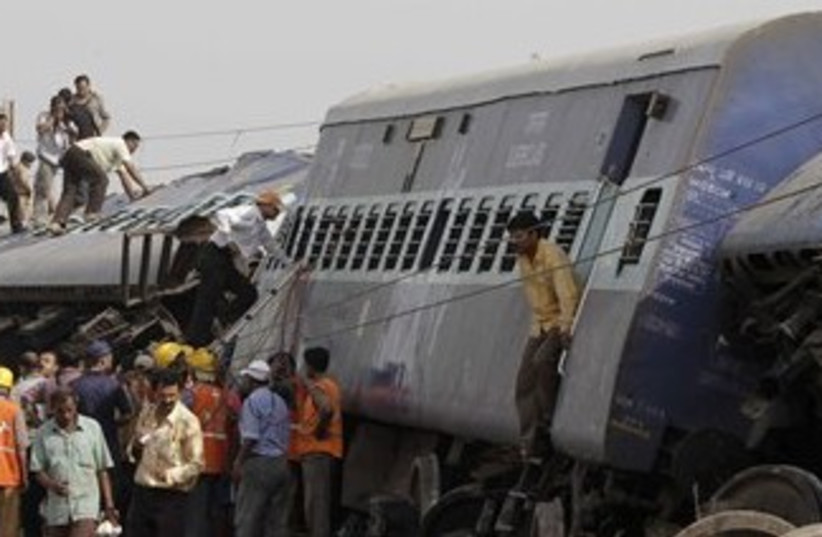 311_India train blast (photo credit: ASSOCIATED PRESS)