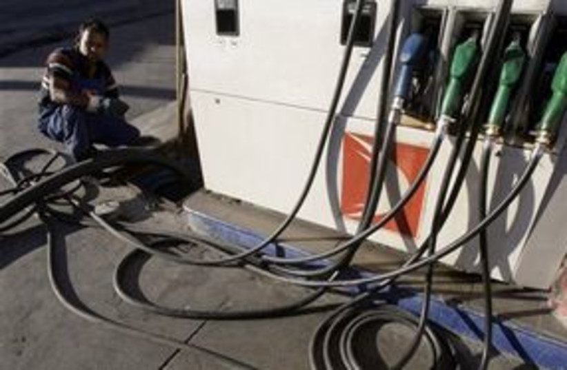 311_gasoline pumps (photo credit: Associated Press)