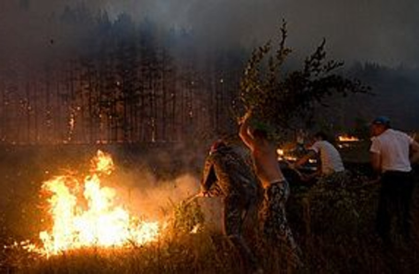 russia fire 311 (photo credit: Associated Press)