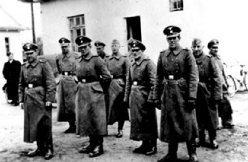 311_Nazi camp guards (photo credit: ASSOCIATED PRESS)