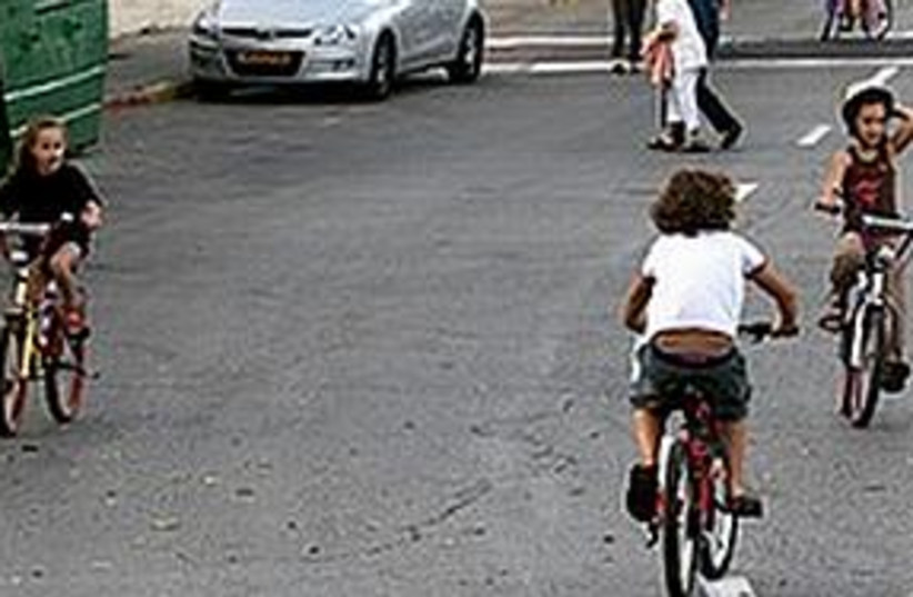 kids ride bikes on Yom Kippur (photo credit: Courtesy)