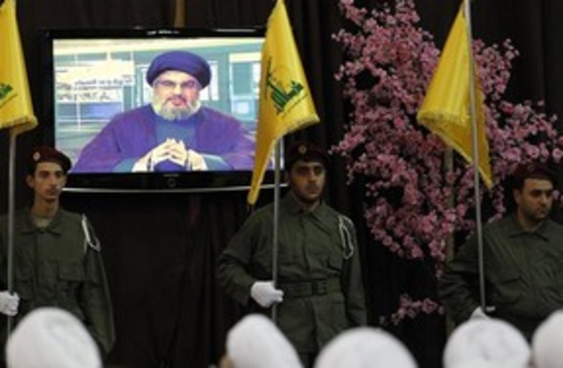 Hizbullah Nasrallah on TV 311 AP (photo credit: Associated Press)