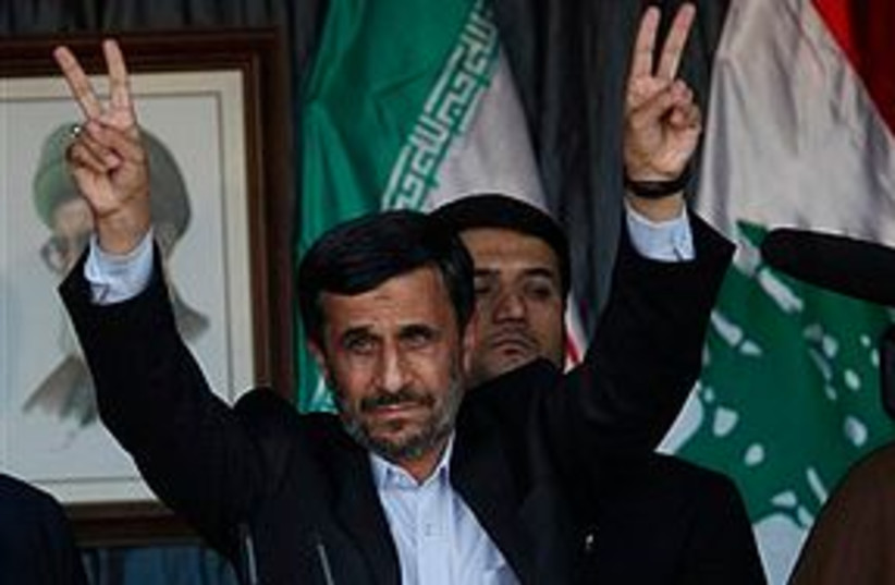 ahmadinejad peace out 311 (photo credit: AP)