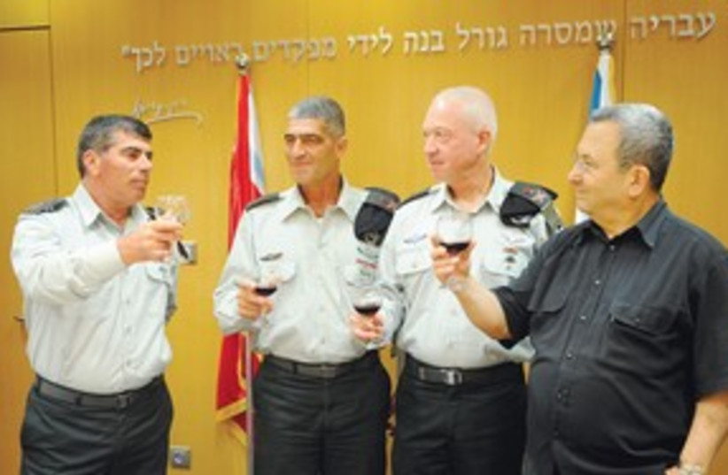 Russo, Galant, Ashkenaza and Barak toast wine 311 (photo credit: IDF Spokesman)
