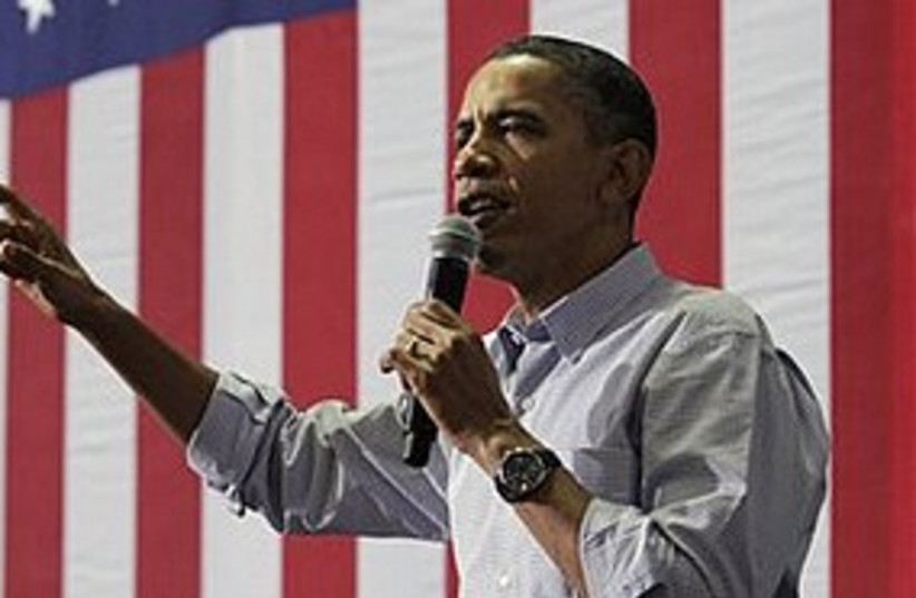 Obama speaking flag 311 AP (photo credit: Associated Press)