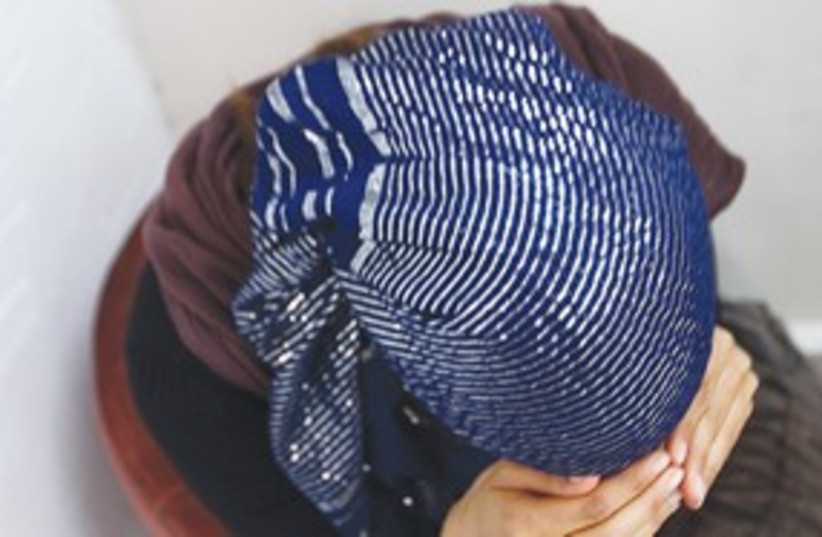 Religions woman hiding her face 311 (credit: Marc Israel Sellem)
