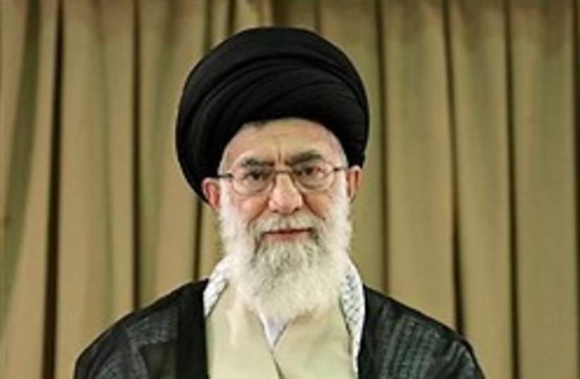 Iranian supreme leader Ayatollah Ali Khamenei sits (photo credit: AP)