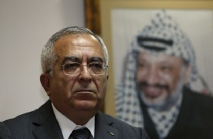 PA PM Fayyad speaking (R) 311 (photo credit: Reuters)