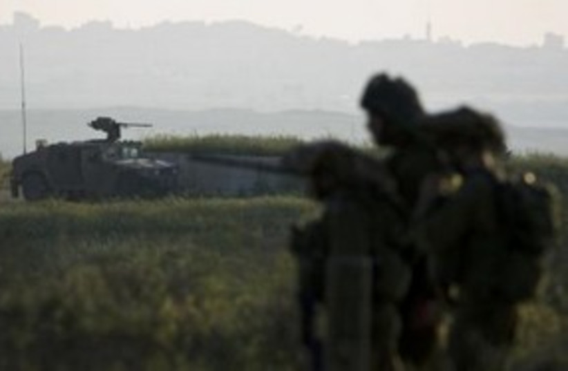 IDF soldiers near Gaza border 311 (R) (photo credit: REUTERS/Amir Cohen)
