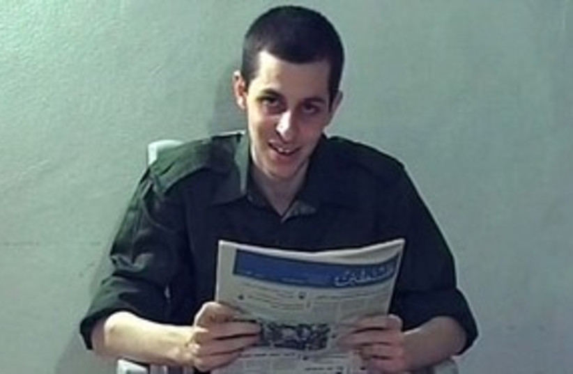 Gilad Schalit in video 311 (R) (credit: Reuters)