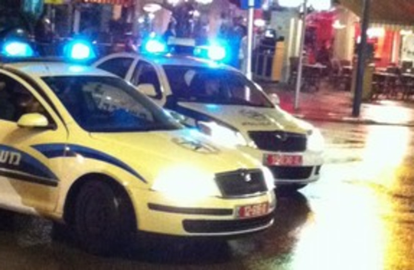 Police car in Tel Aviv at night 311 (photo credit: Yoni Cohen)
