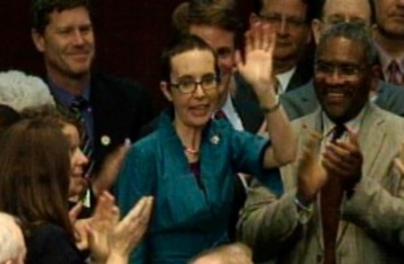 Gabrielle Giffords returns to the US Congress 311 (R) (photo credit: REUTERS)