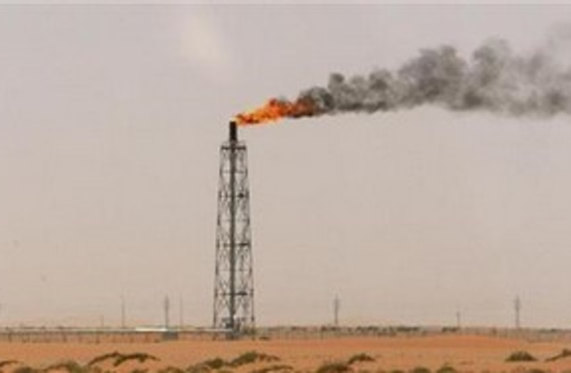Oil derrick 311 (photo credit: Reuters/Ali Jarekji)