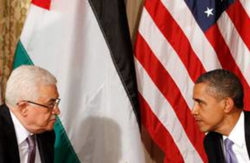 US President Obama with PA President Abbas 311 (R) (photo credit: REUTERS/Kevin Lamarque)
