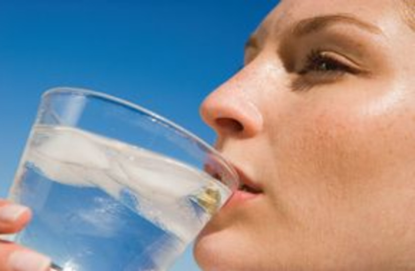 Woman drinking water 311 (photo credit: Thinkstock/Imagebank)