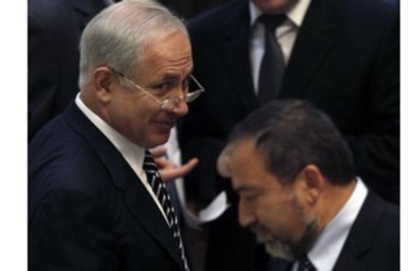 PM Binyamin Netanyahu and FM Avigdor Lieberman 311 (R) (photo credit: Ronen Zvulun / Reuters)