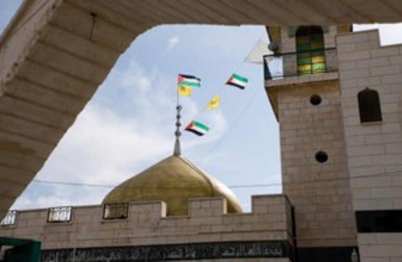 Palestinian flags, mosque_311 (photo credit: Thinkstock/Imagebank)