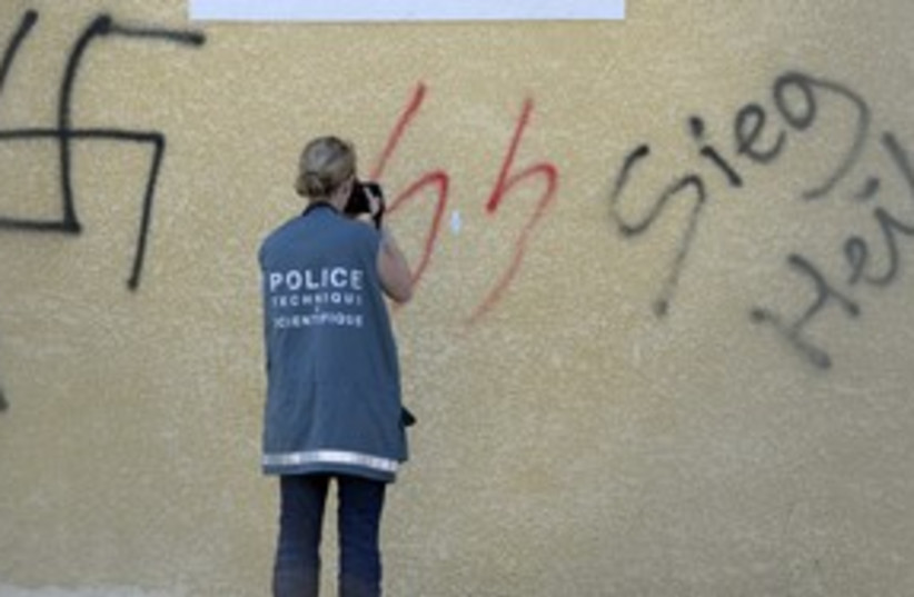 Swastika grafitti 311 (photo credit: REUTERS)