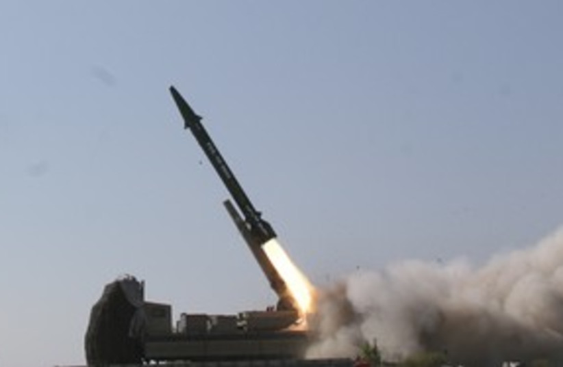 Iranian ballistic missile 311 (R) (photo credit: Fars News / Reuters)