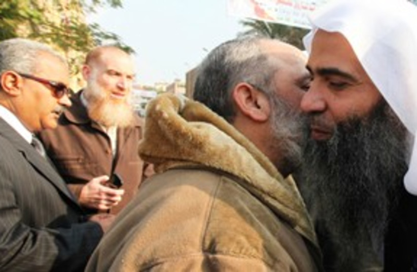 Nour party candidate Egypt Islamist kiss 311 (R) (photo credit: REUTERS/Amr Abdallah Dalsh)