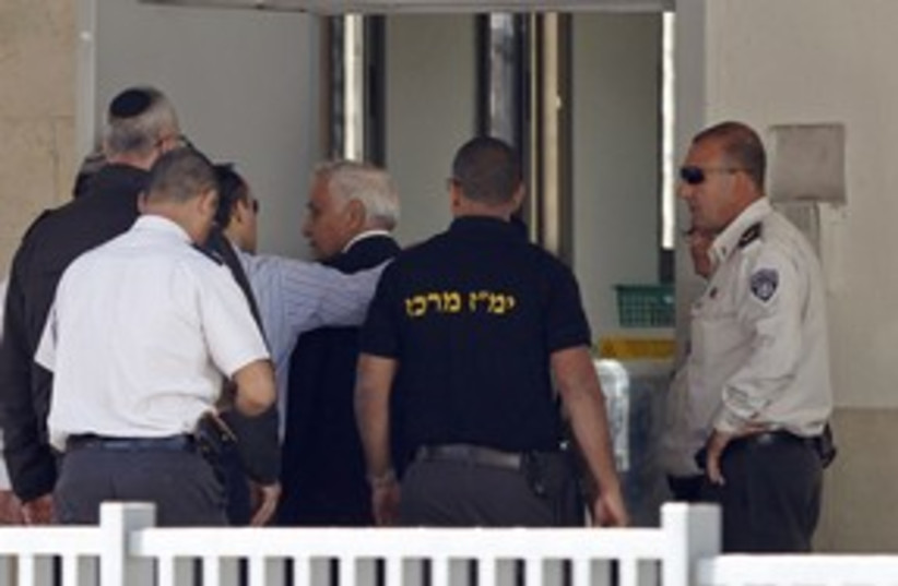 Katsav enters Massiyahu prison_311 (photo credit: Reuters)