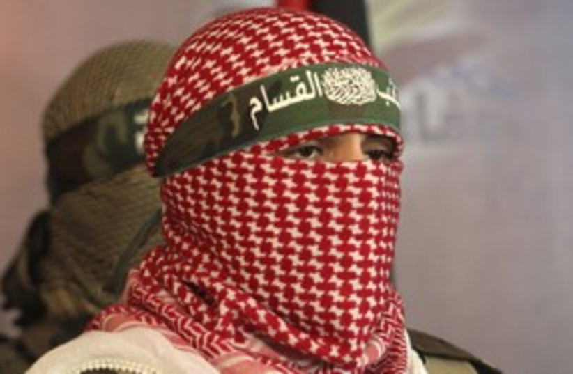 A member of the Kassam Brigades (photo credit: REUTERS/Ismail Zaydah)