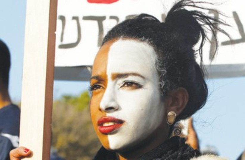 Protesting against discrimination in Jerusalem 390 (photo credit: Baz Ratner/Reuters)