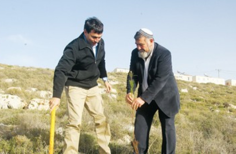 Danny Danon and Gershon Mesika plant a tree 390 (photo credit: Samaria, It’s Nice to Know You initiative)