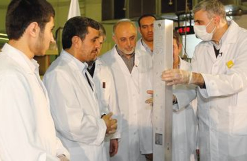 Ahmadinejad at nuclear ceremony in Tehran 390 (R) (photo credit: REUTERS)