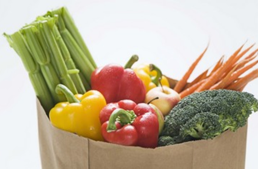 Grocery bag full of vegetables 390 (credit: Thinkstock/Imagebank)