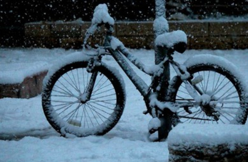 Bike covered in snow 390